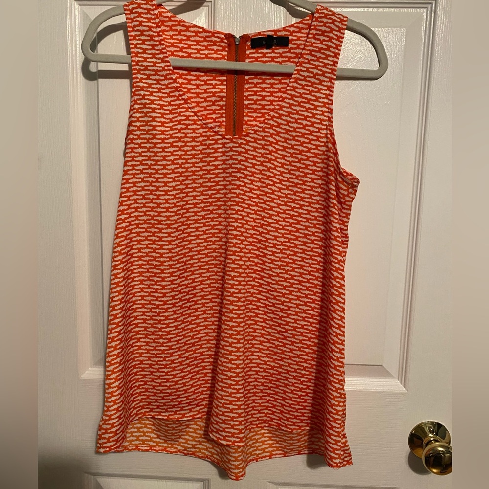 Eclair sleeveless v neck blouse with quarter zip back detail